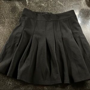 Black pleated skirt- Francesca’s, brand new with tags
